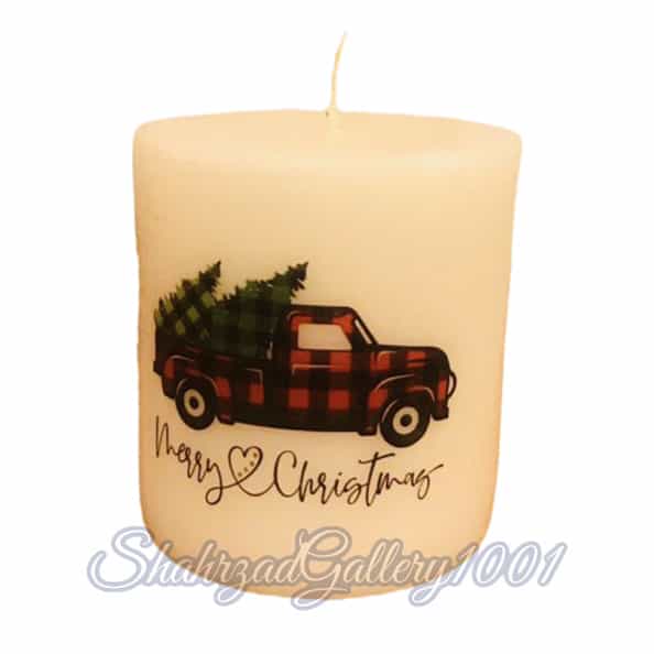 شمع استوانه ای تزیینی با طرح ماشین حمل کاج و تبریک کریسمس گالری شهرزاد اسدی